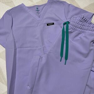 Jaanuu Lavender Scrub Set with Teal Accents
